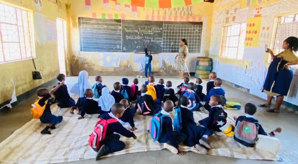 Students at Imbaseni Primary School near Arusha Tanzania — a Deeper Africa sponsored school visited on Tanzania community safari itineraries