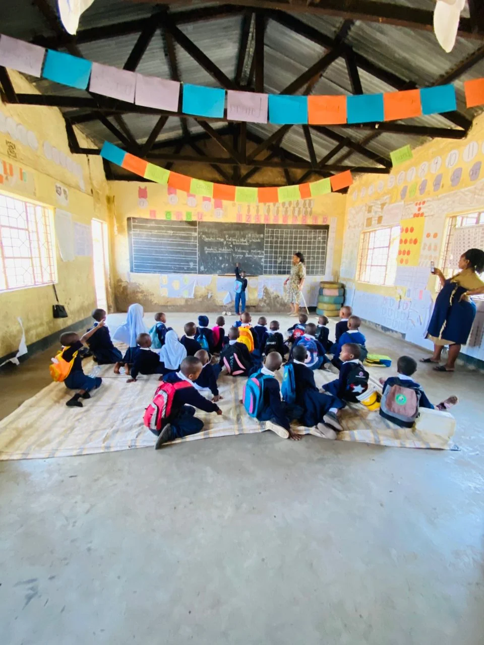 Students at Imbaseni Primary School near Arusha Tanzania — a Deeper Africa sponsored school visited on Tanzania community safari itineraries