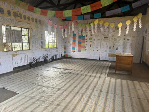 Children learning at Imbaseni Primary School near Arusha Tanzania — school visited on Deeper Africa's Tanzania safari programs