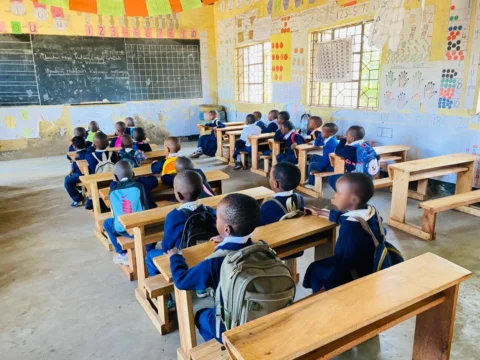 Imbaseni Primary School students near Arusha Tanzania — children who walk up to four hours daily to attend the only school in their village